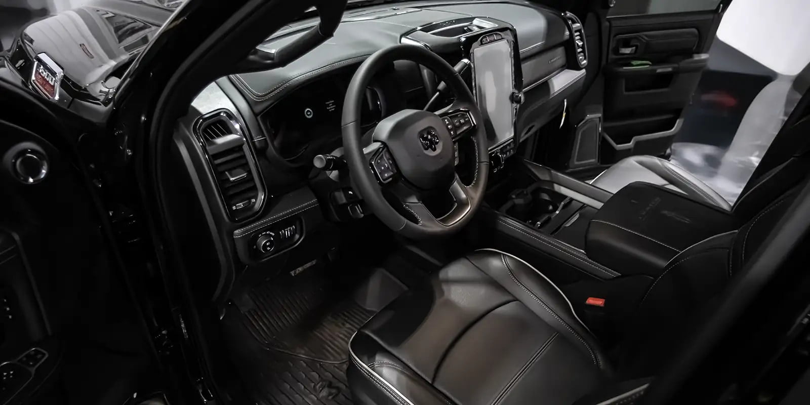 The interior of a 2024 Dodge Ram 3500 offered by Luxe Trucks.