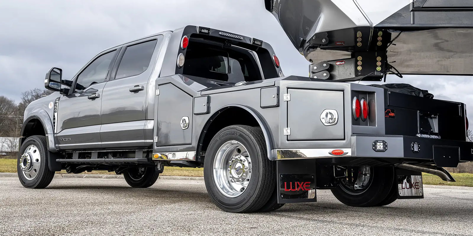 A Luxe Trucks Utility Bodywerks Ford F-550 with custom aluminum hauler bed.