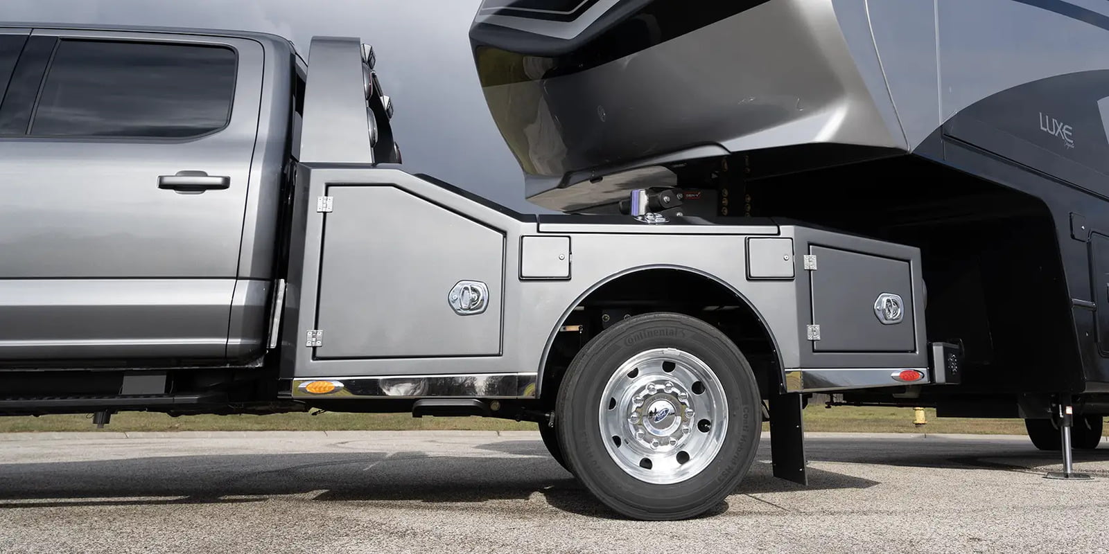 A Luxe Trucks Utility Bodywerks Ford F-550 with custom aluminum hauler bed.