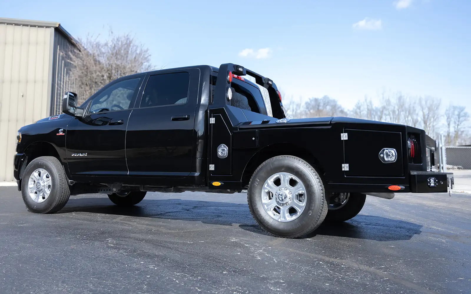 A Luxe Trucks Dodge 3500 fifth wheel hauler truck with an all aluminum single rear wheel hauler bed.