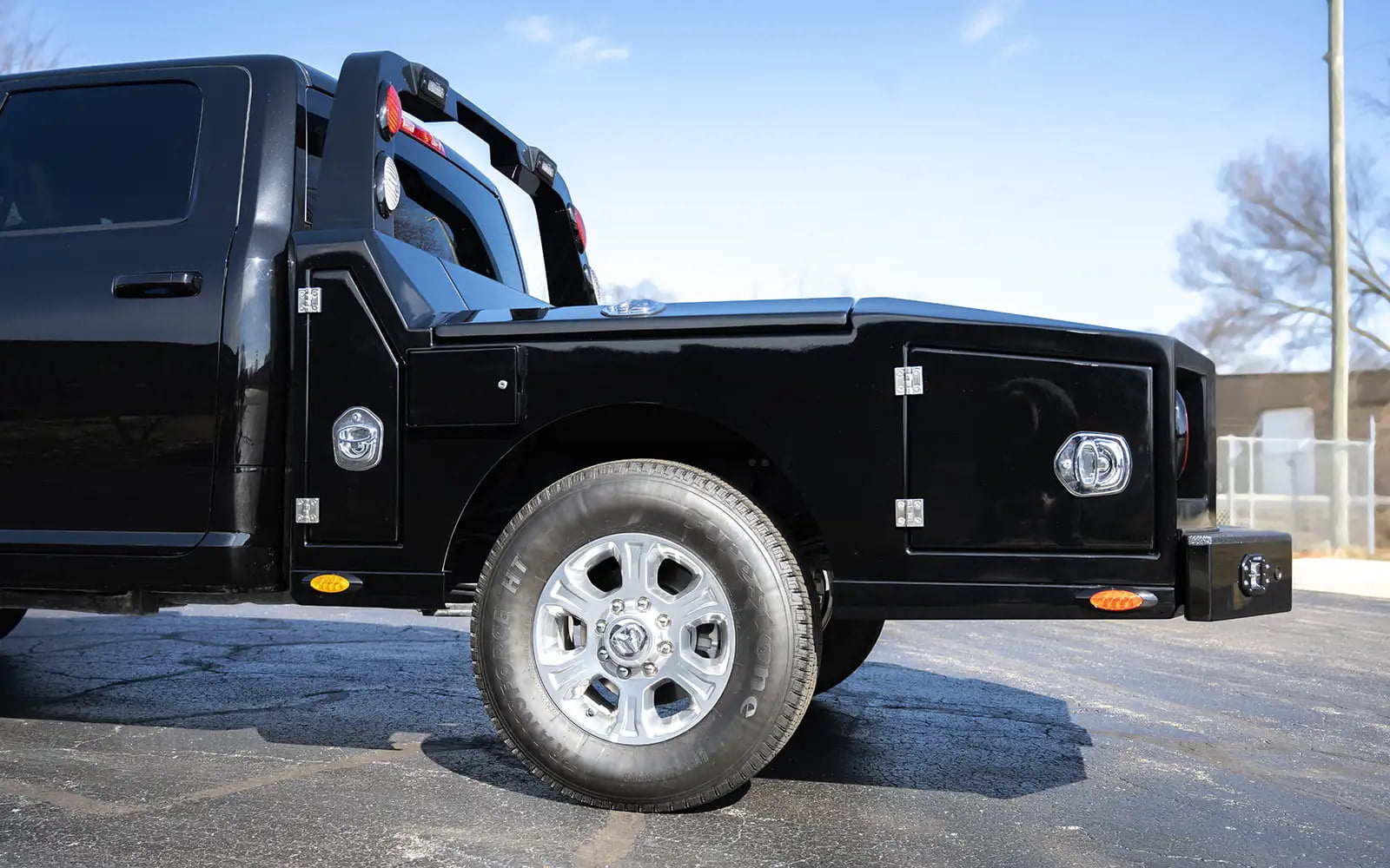 A Luxe Trucks Dodge 3500 fifth wheel hauler truck with an all aluminum single rear wheel hauler bed.