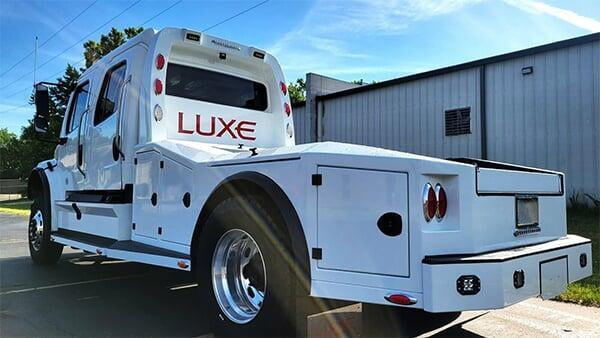 luxe whilte rv hauler freightliner